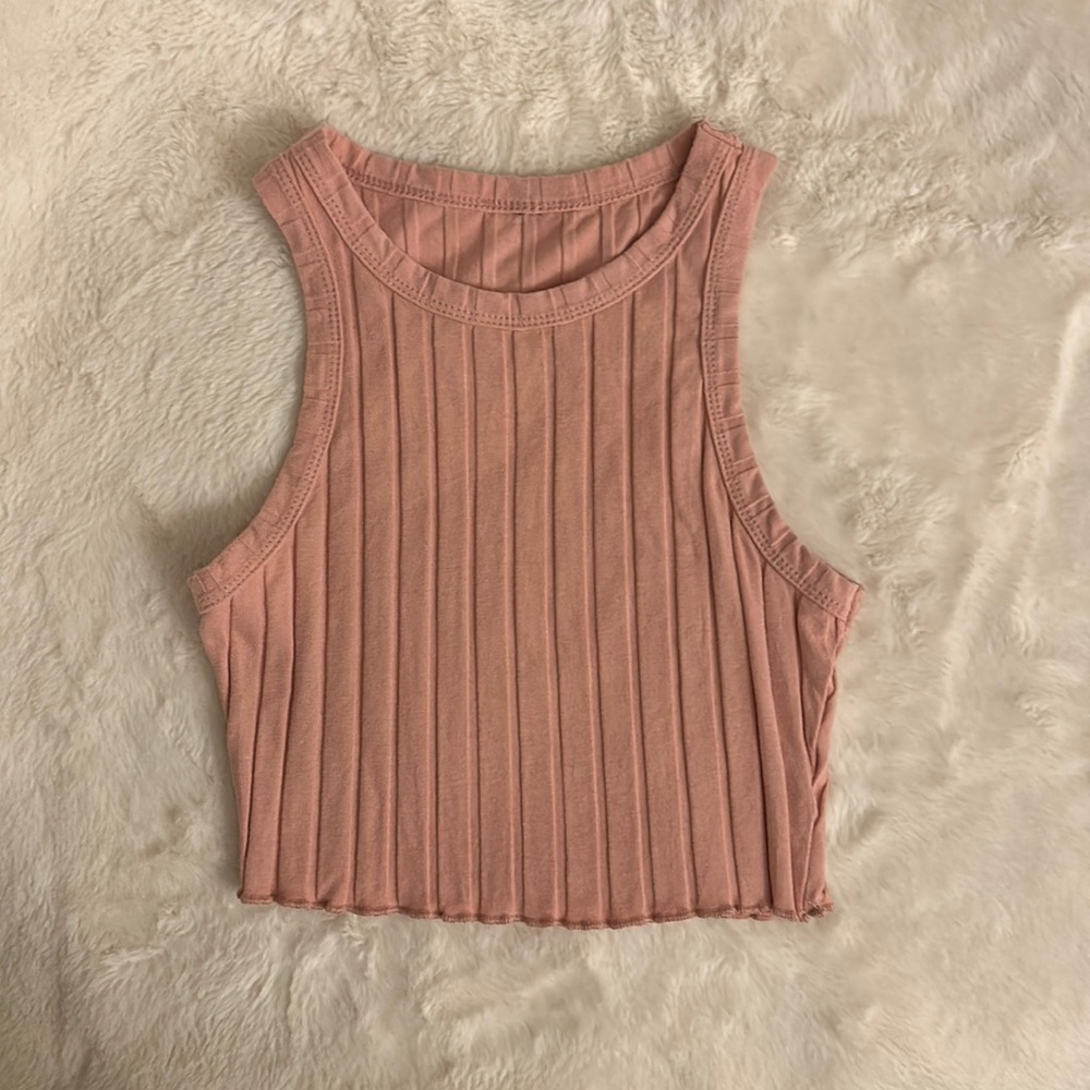 Pink tank top. Lettuce hem